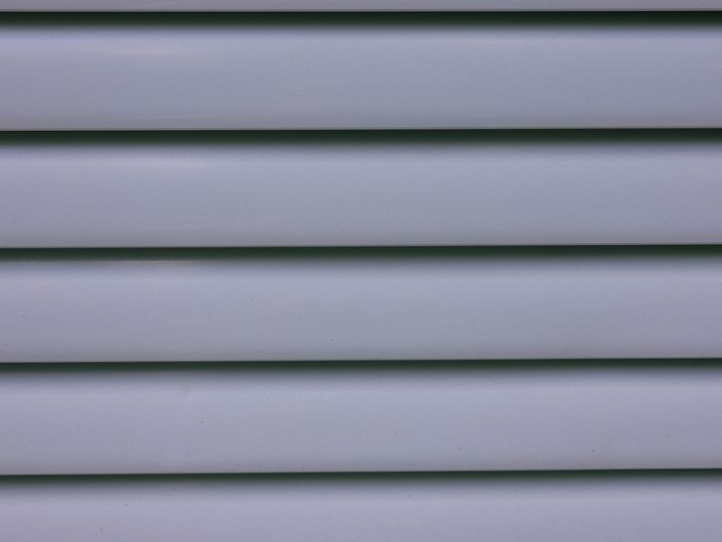 Clean vinyl siding installation on residential home